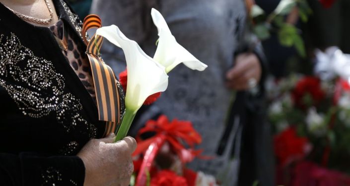 В рамках праздничных мероприятий, приуроченных к 76-летию Победы в Великой Отечественной войне возле мемориального комплекса Вечный огонь в Оше состоялся митинг-реквием В рамках праздничных мероприятий, приуроченных к 76-летию Победы в Великой Отечественной войне возле мемориального комплекса Вечный огонь в Оше состоялся митинг-реквием