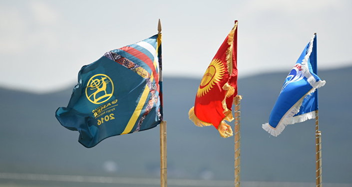 Логотип всемирных игр кочевников и флаг Кыргызстана. Архивное фото