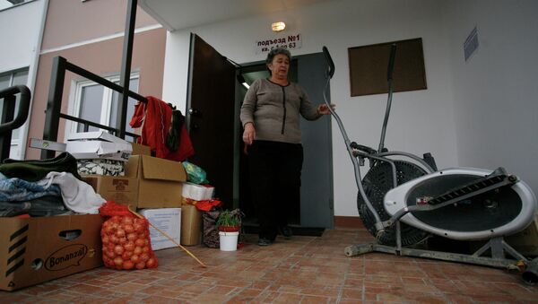 Заселение пострадавших от наводнения в Крымске в новые дома - Sputnik Кыргызстан