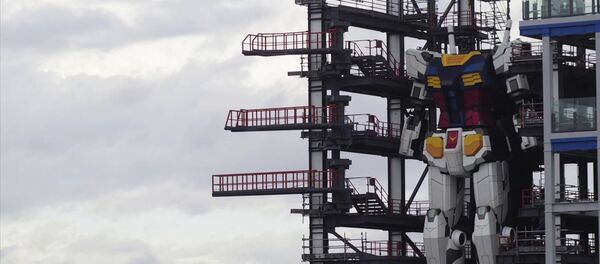 Японский робот Gundam высотой в 18 метров сделал первые шаги — видео - Sputnik Кыргызстан