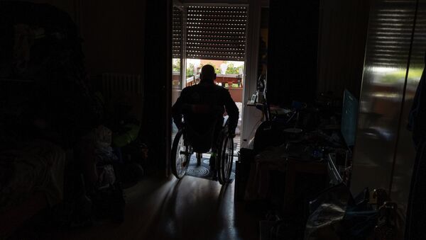 Мужчина в инвалидной коляске. Архивное фото - Sputnik Кыргызстан