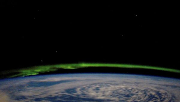 Северного сияния на орбите Земли. Архивное фото - Sputnik Кыргызстан
