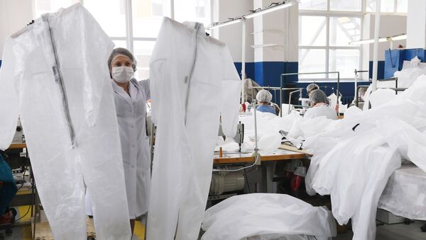 Производство противовирусных костюмов в Казани - Sputnik Кыргызстан