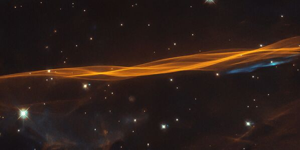 Участок взрывной волны от сверхновой звезды Лебедь, расположенной примерно в 2400 световых годах от нас - Sputnik Кыргызстан