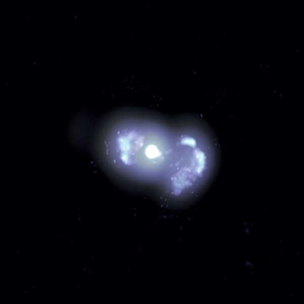 Многочастотное составное изображение галактики TXS 0128+554, находящейся на расстоянии 500 миллионов световых лет от Земли, полученное Национальной радиоастрономической обсерваторией США - Sputnik Кыргызстан