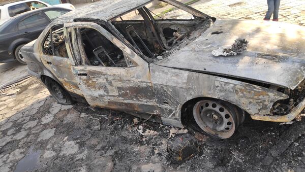 Сгоревшее авто на пересечении улиц Гагарина и Маликова в Бишкеке - Sputnik Кыргызстан