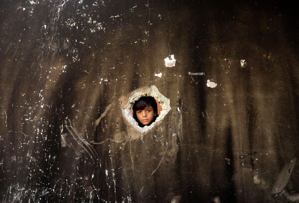 Ситуация в лагере беженцев Аль-Нусират в центре сектора Газа в Палестине - Sputnik Кыргызстан