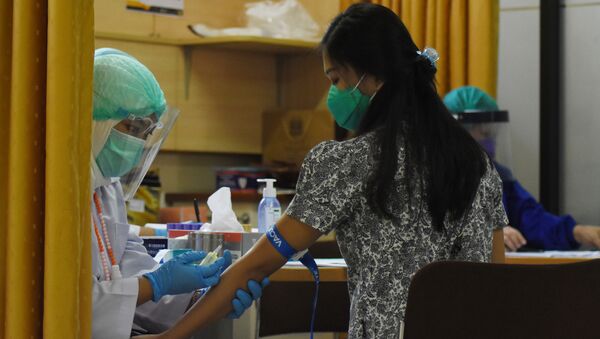 Испытание вакцины в Индонезии - Sputnik Кыргызстан