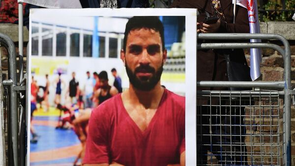 Акция протеста против казни иранского борца Навида Афкари у посольства Ирана в Лондоне - Sputnik Кыргызстан
