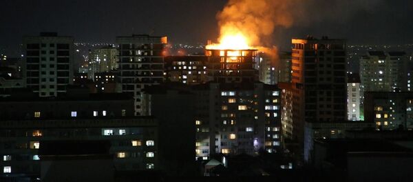 Пожар в строящемся многоэтажном доме по улице Тыналиева в Бишкеке - Sputnik Кыргызстан