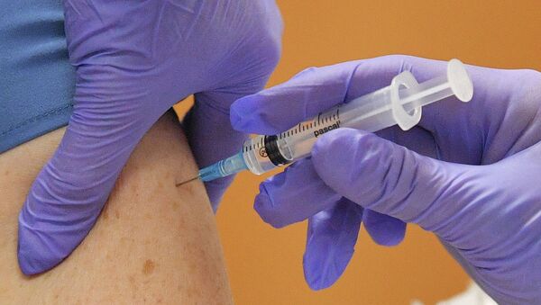 Во время вакцинации пациентов поликлиники против COVID-19. Архивное фото - Sputnik Кыргызстан