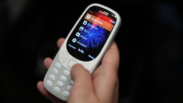 Классическая модель мобильного телефона Nokia. Архивное фото - Sputnik Кыргызстан