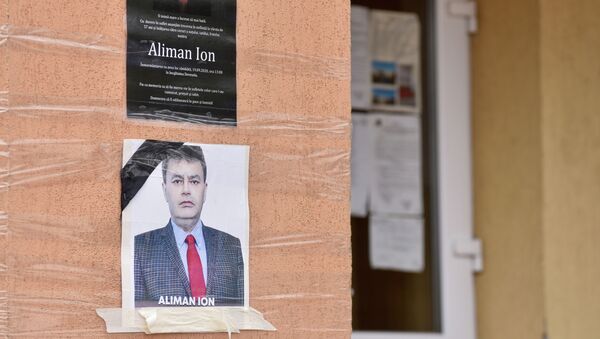 Портрет умершего из-за осложнений от коронавируса бывшего мэра румынского города Девеселу Иона Алимана - Sputnik Кыргызстан