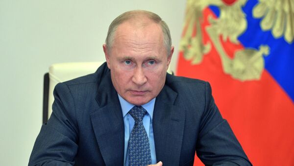 Президент РФ Владимир Путин во время совещания в режиме видеоконференции - Sputnik Кыргызстан