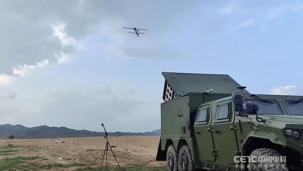 Китайцы научились массово запускать в небо дроны-камикадзе — видео - Sputnik Кыргызстан