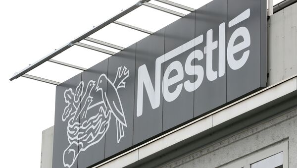 Логотип компании Nestle. Архивное фото - Sputnik Кыргызстан