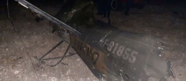 Обломки российского вертолета Ми-24, сбитого в воздушном пространстве над территорией Армении вне зоны боевых действий - Sputnik Кыргызстан