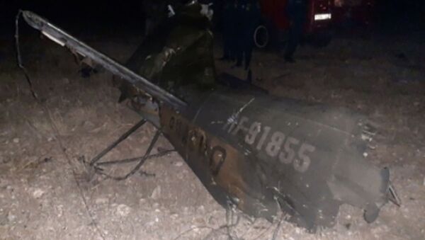 Обломки российского вертолета Ми-24, сбитого в воздушном пространстве над территорией Армении вне зоны боевых действий - Sputnik Кыргызстан
