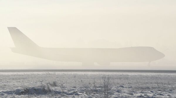 Коюу туманда турган учак. Архивдик сүрөт - Sputnik Кыргызстан