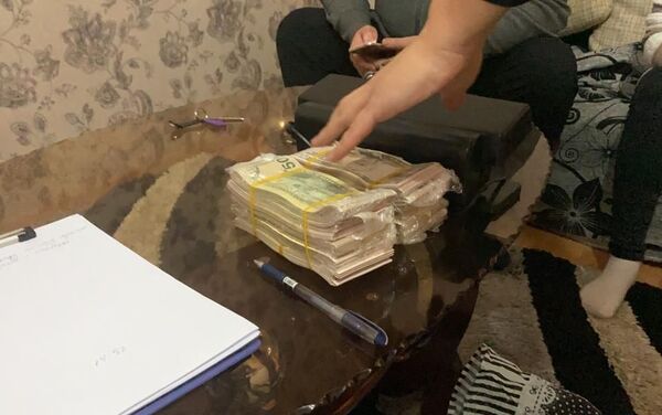 Досудебное производство ведется по статье 255 Подделка денег и ценных бумаг в особо крупном размере Уголовного кодекса КР - Sputnik Кыргызстан