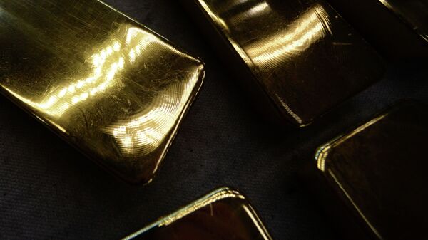 Слитки золота высшей пробы. Архивное фото - Sputnik Кыргызстан