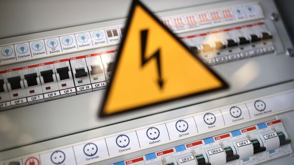 Знак Осторожно! Электрическое напряжение. Архивное фото - Sputnik Кыргызстан