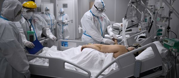 Оорукананын жандандыруу бөлүмүндөгү медициналык кызматкерлер. Архив - Sputnik Кыргызстан