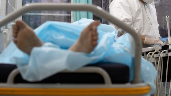 Пациент в больничной койке. Архивное фото - Sputnik Кыргызстан