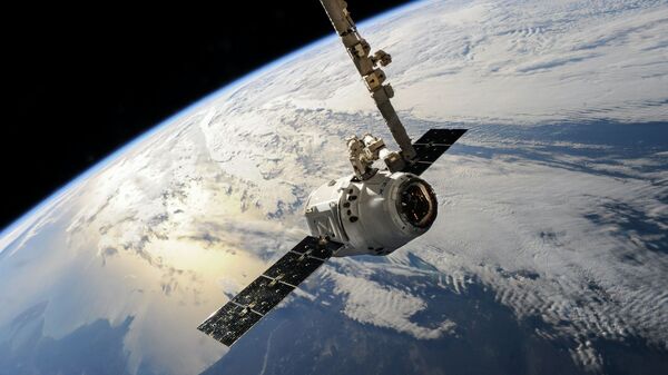 Спутник на земной орбите. Иллюстративное фото - Sputnik Кыргызстан