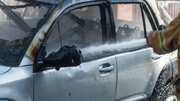 Сгоревший автомобиль. Архивное фото - Sputnik Кыргызстан