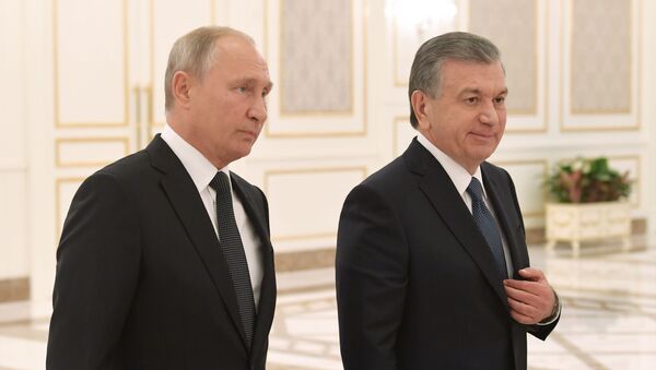 Президент РФ Владимир Путин и президент Узбекистана Шавкат Мирзиеев. Архивное фото - Sputnik Кыргызстан