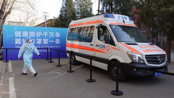 Автомобиль скорой помощи возле центра вакцинации в Пекине. Архивное фото - Sputnik Кыргызстан