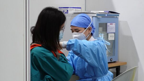 Вакцинация от коронавируса в Пекине - Sputnik Кыргызстан