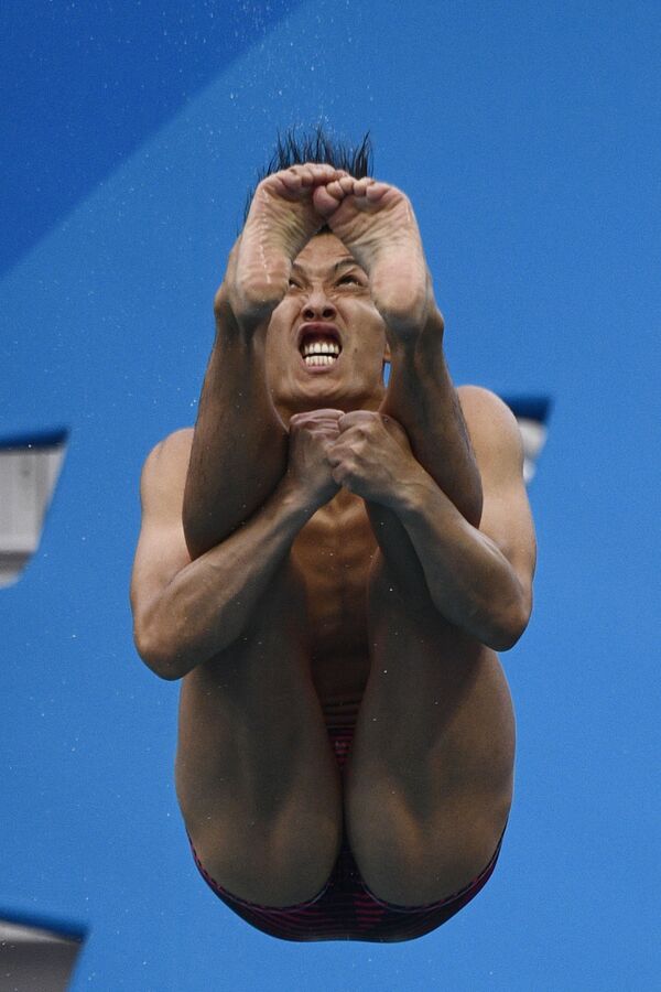 Японский прыгун в воду Ken Terauchi на Олимпийских играх в Рио-де-Жанейро  - Sputnik Кыргызстан