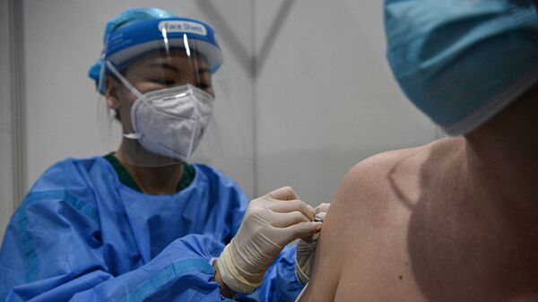 Вакцинация от коронавируса в Пекине - Sputnik Кыргызстан
