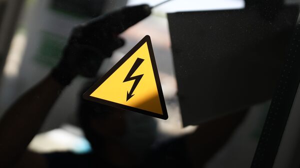 Знак Осторожно! Электрическое напряжение. Архивное фото - Sputnik Кыргызстан