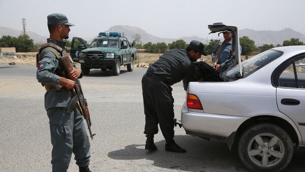 Сотрудники национальной полиции Афганистана на КПП в Кабуле - Sputnik Кыргызстан