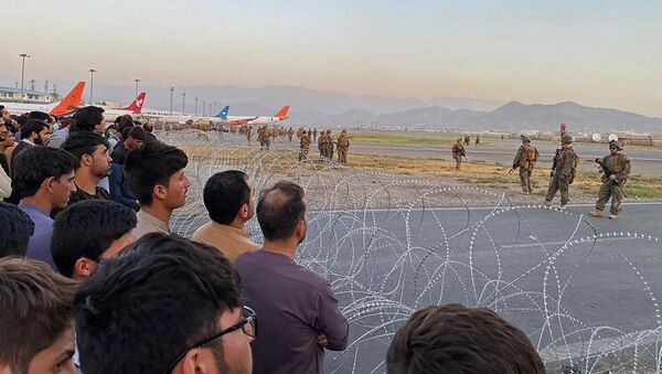 Кабул шаарынын аэропортундагы адамдар. Архив - Sputnik Кыргызстан