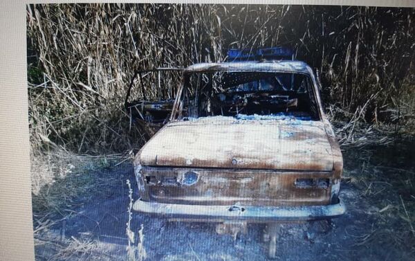 Автомобиль подозреваемого в убийстве, который сжег свою машину среди камышей в селе Жаны-Пахта. - Sputnik Кыргызстан