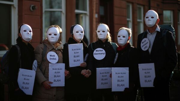 Акция протеста активистов Extinction Rebellion во время конференции ООН по изменению климата (COP26) в Глазго, Великобритания. 4 ноября 2021 года - Sputnik Кыргызстан