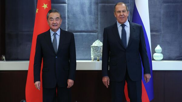 Министр иностранных дел РФ Сергей Лавров и министр иностранных дел Китая Ван И  - Sputnik Кыргызстан