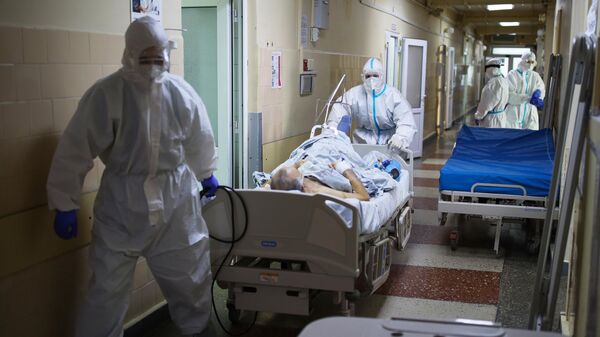 Лечение пациентов с COVID-19 в больнице. Архивное фото - Sputnik Кыргызстан