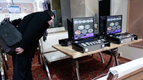 Игральные автоматы в букмекерской конторе. Архивное фото - Sputnik Кыргызстан