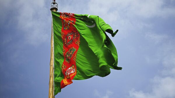 Государственный флаг Туркменистана в Ашхабаде. Архивное фото - Sputnik Кыргызстан