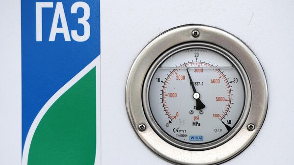 Заправочная колонка на автомобильной газонаполнительной компрессорной станции. Архивное фото - Sputnik Кыргызстан