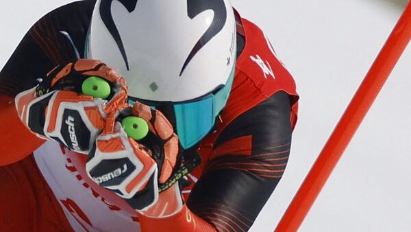 Китайский горнолыжник Янмин Чжан на XXIV зимних Олимпийских играх в Пекине - Sputnik Кыргызстан
