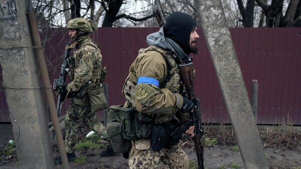 Украинские военные в Буче (Украина) - Sputnik Кыргызстан