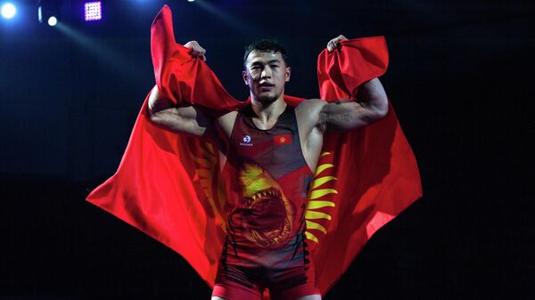 Токио Олимпиадасынын күмүш байге ээси Акжол Махмудов. Архив - Sputnik Кыргызстан
