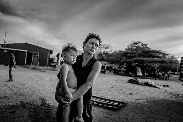 Снимок из серии &quot;Венесуэльский мигрант&quot; датского фотографа Яна Грарупа, победивший в категории &quot;Профессиональное документальное кино&quot; - Sputnik Кыргызстан