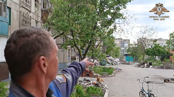 Мариуполь тургуну: кошуналарды атып, батирлерди өрттөштү. Видео - Sputnik Кыргызстан